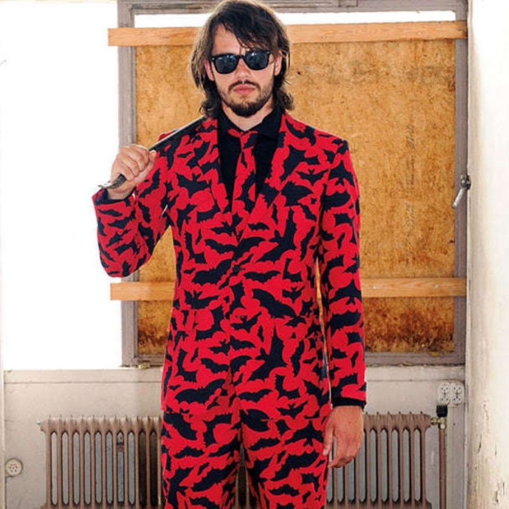 Super cool bat pattern suit. Only worn once!!